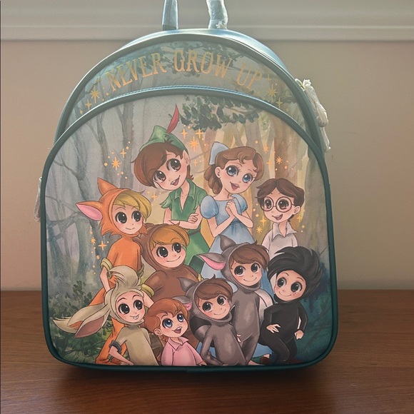 Loungefly Handbags - Loungefly Peter Pan Character Backpack - Green and Multicolor